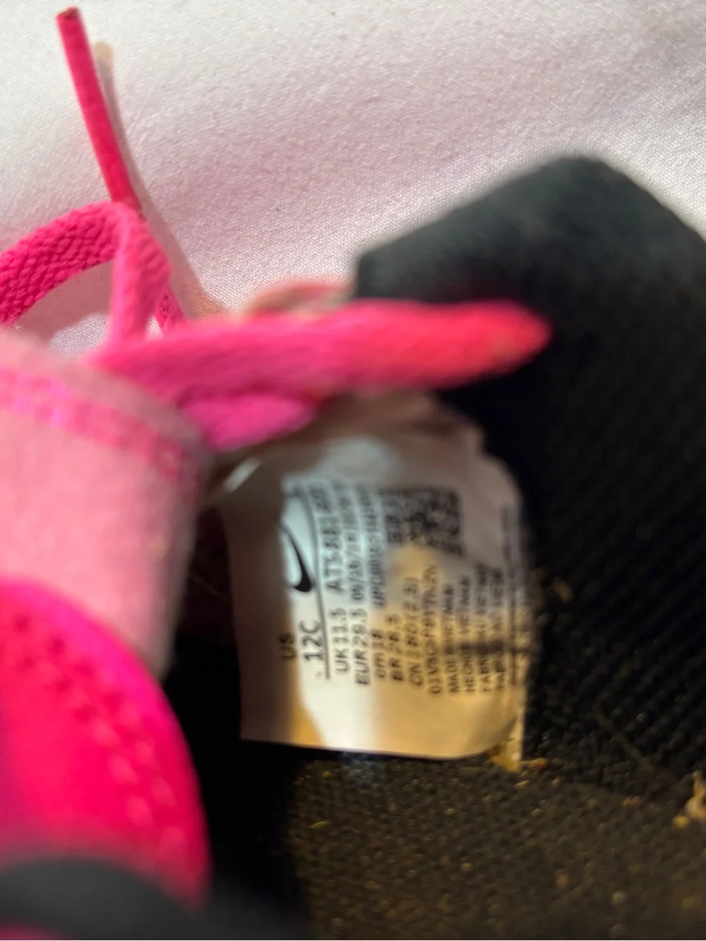 Kids Pink Nike cleats sz 12c